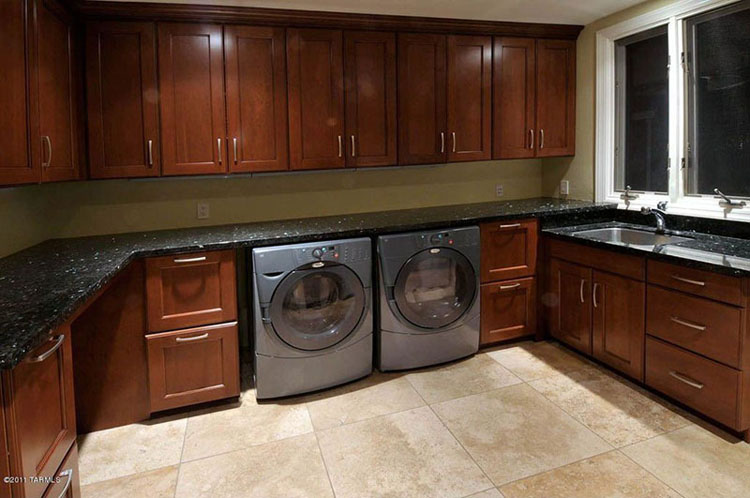 Laundry room with blue pearl granite