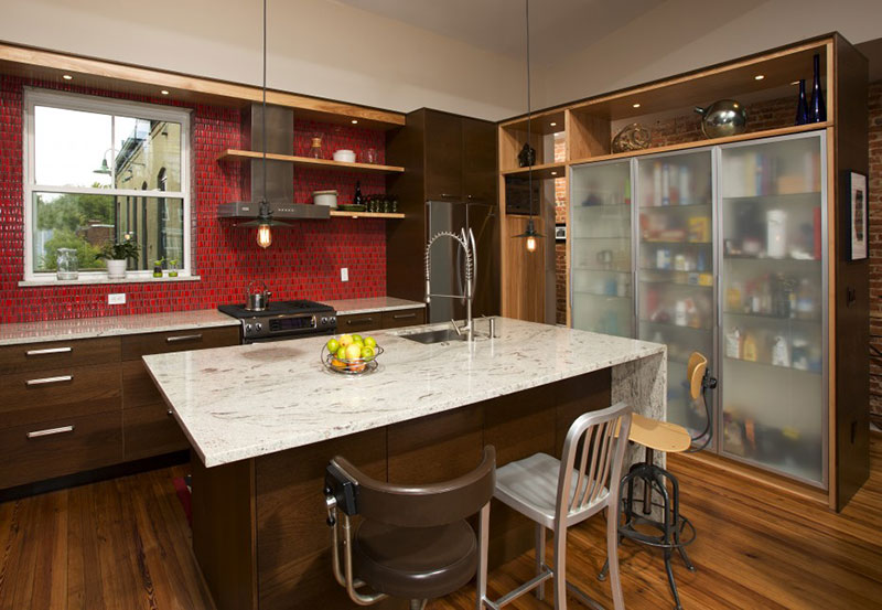 Kitchen With Broen Cabinets And Valley White Granite Countertops